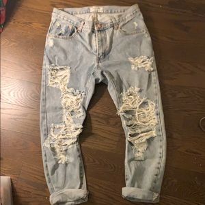 One teaspoon ripped boyfriend jeans.